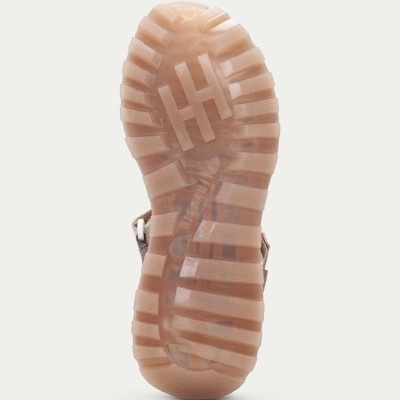 Sola de sapato transparente castanha clara com padrão ranhuras largas e símbolo HH