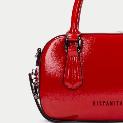 Mala vermelha de mão brilhante com alça e marca HISPANITAS