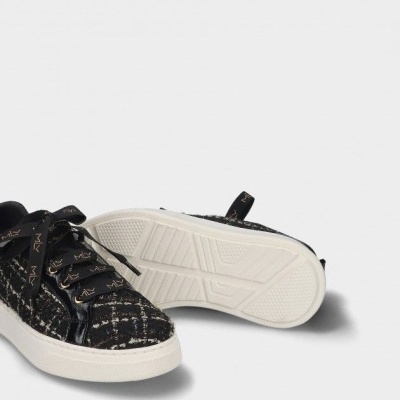 ténis baixos em tecido tweed preto e branco com sola branca