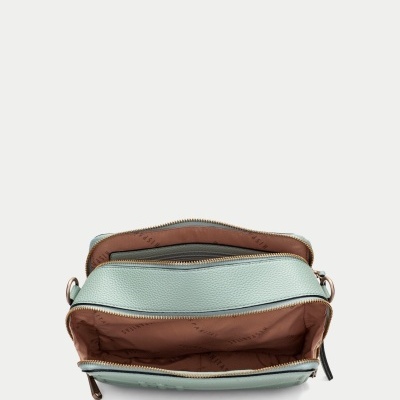 Mala pequena verde água com interiores castanhos e fechos