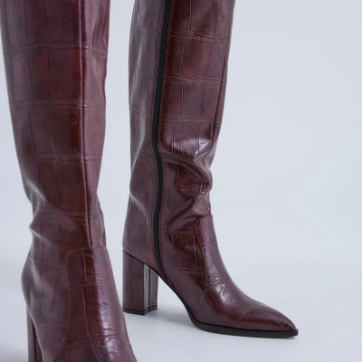 https://www.anajosapataria.com/product/bota-cano-alto-exe-fieeira-444-bordeaux