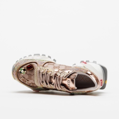 Ténis feminino dourado com pedras e sola branca