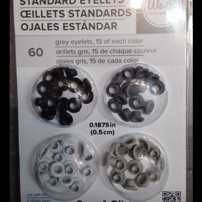 Embalagem de ilhós padrão em vários tons de cinza.