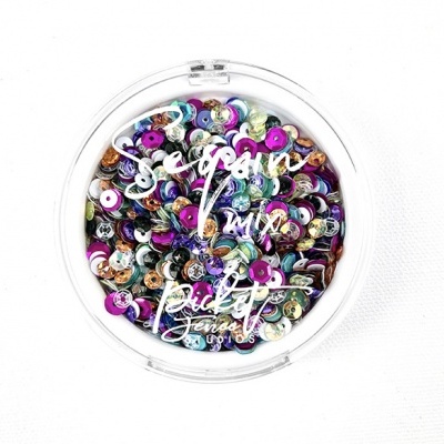 Pote redondo transparente com lantejoulas coloridas e texto branco na tampa