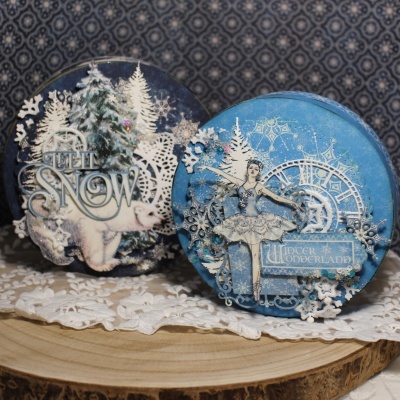 Caixas decorativas redondas azuis com temas de inverno e Natal, incluindo bailarina e urso polar