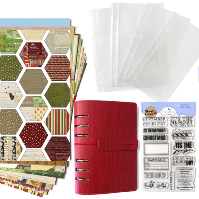 Conjunto para scrapbooking natalício com papéis decorativos, caderno vermelho, folhas plásticas, selos de borracha e matrizes metálicas