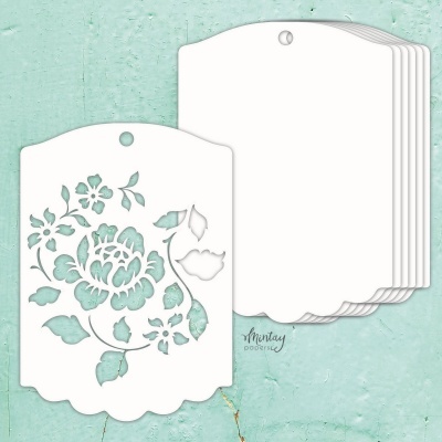 Seis moldes de papel branco com padrão floral recortado e furo para pendurar