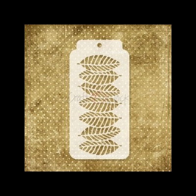 Etiqueta branca com padrão de folhas recortadas sobre fundo amarelo envelhecido com bolinhas brancas