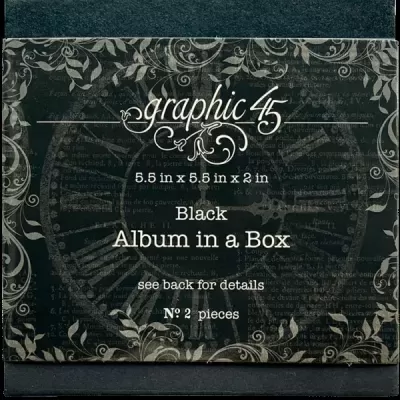 Caixa preta com texto e padrões florais cinza 