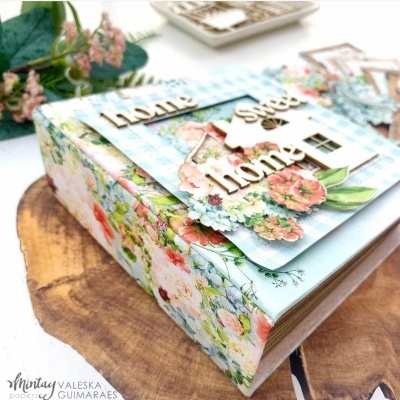 Caixa decorativa floral com texto 'home sweet home'