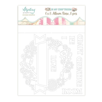 Produto de scrapbooking com moldura floral e palavras em relevo branco em embalagem decorativa.