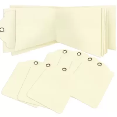 Etiquetas de papel creme com reforço metálico e álbum dobrável creme.