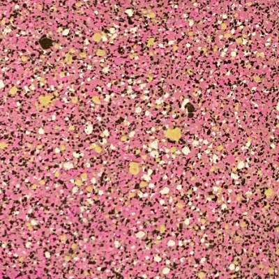 Superfície rosa com padrão pontilhado multicolorido em dourado, branco e preto