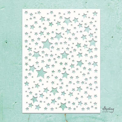 Painel decorativo branco com padrão de estrelas em fundo verde menta