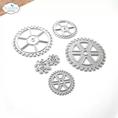 Conjunto de engrenagens metálicas decorativas de vários tamanhos sobre fundo branco