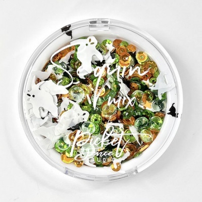 Pacote redondo transparente com lantejoulas coloridas e figuras de coelhos brancos