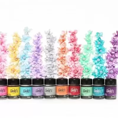 Frascos de pigmentos coloridos Lindy's com flores a combinar em fileira