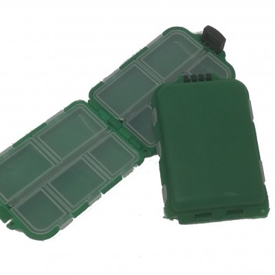 Estojo organizador verde em plástico com compartimentos transparentes