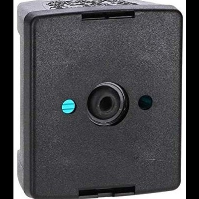 Fotografia de uma impressora fotográfica preta compacta com lente central