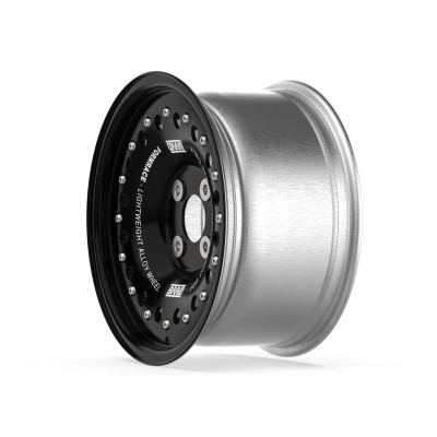 Black and silver alloy car wheel with text FORMARACE LIGHTWEIGHT ALLOY WHEEL