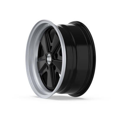 Black car wheel rim with silver edge, six spokes