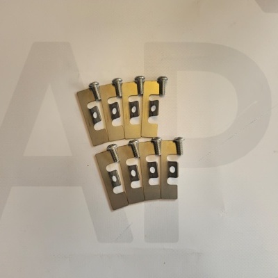 Eight metal clips with screws on a white surface