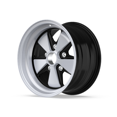 Silver and black car wheel rim with five spokes