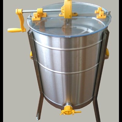 Dispositivo metálico prateado com tampa transparente e componentes amarelos