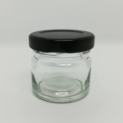 Frasco pequeno de vidro com tampa preta