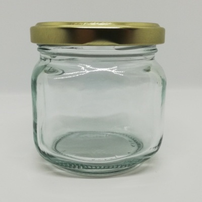 Frasco de vidro com tampa dourada