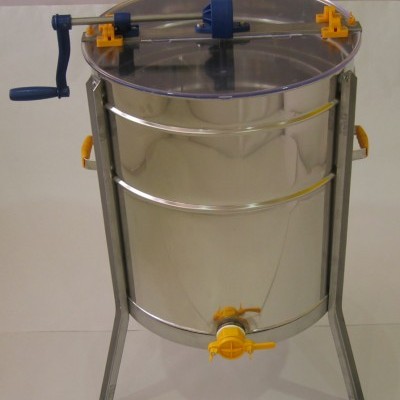 Extrator de mel em aço inoxidável com manivela azul e válvula amarela.