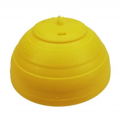 Tampa de silicone amarelo em forma de cúpula para vedar recipientes.