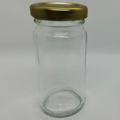 Frasco de vidro transparente com tampa metálica dourada