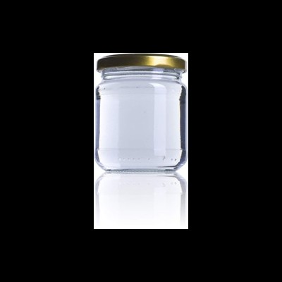 Frasco de vidro transparente com tampa dourada sobre fundo branco