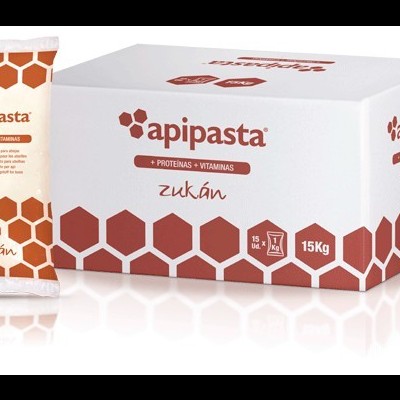 Embalagem e caixa branca do produto apipasta com padrão hexagonal castanho