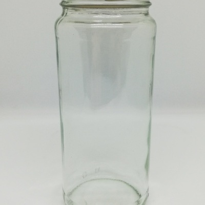 Frasco de vidro transparente com tampa metálica dourada