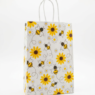 Saco de papel decorado com abelhas e flores amarelas