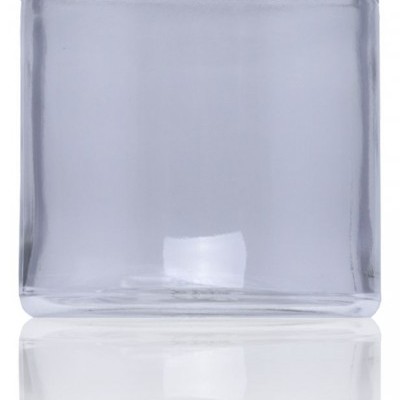 Frasco de vidro transparente com tampa dourada