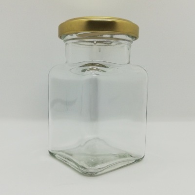 Frasco de vidro quadrado com tampa dourada