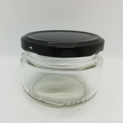 Frasco de vidro transparente com tampa preta