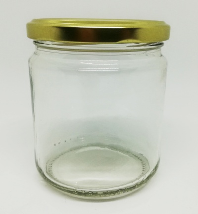 Frasco de vidro transparente com tampa dourada