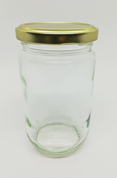 frasco de vidro com tampa dourada