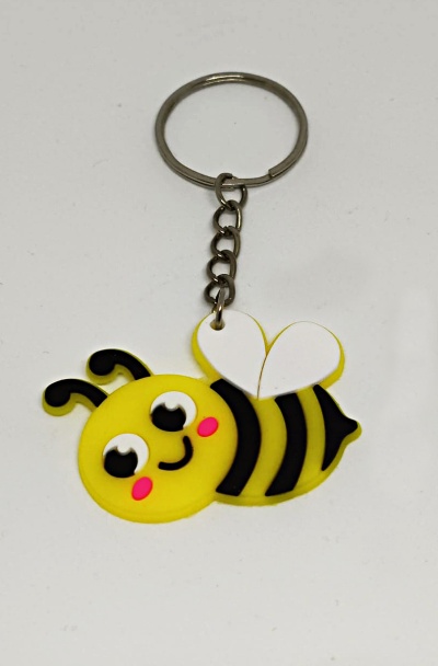 porta-chaves abelha amarela borracha com olhos grandes e bochechas cor-de-rosa