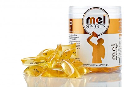 Recipiente com cápsulas de mel amarelas translúcidas da marca mel SPORTS