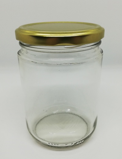 Frasco de vidro transparente com tampa dourada