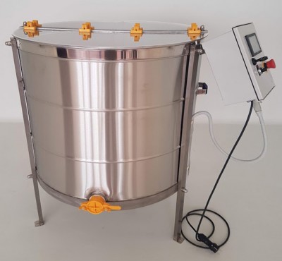 Tanque industrial em aço inoxidável com painel de controlo e torneira amarela