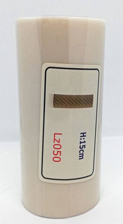 Vela cilíndrica bege clara com etiqueta mostrando altura e código