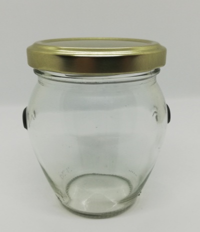 Frasco de vidro com tampa dourada