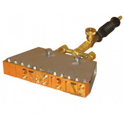 Dispensador metálico com punho preto e base retangular com válvulas em metal dourado