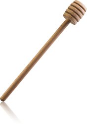 Colher de mel de madeira com ranhuras em fundo branco